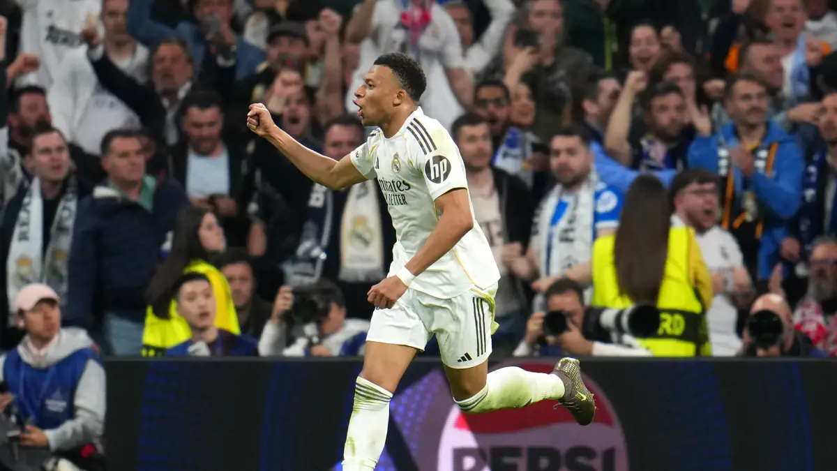MADRID, SPAIN - APRIL 07: Kylian Mbappe of Real Madrid celebrates scoring his team's first goal during the UEFA Champions League 2025/26 Quarter-Final First Leg match between Real Madrid CF and FC Bayern München at Estadio Santiago Bernabeu on April 07, 2026 in Madrid, Spain. (Photo by Aitor Alcalde/Getty Images)