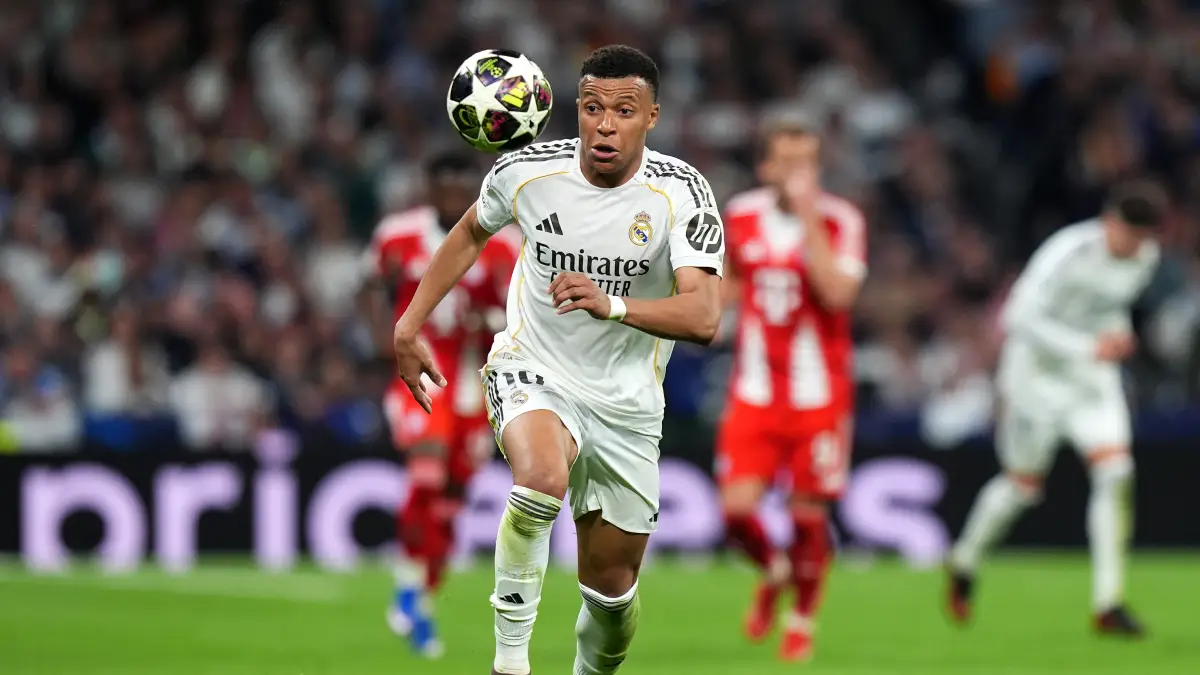 MADRID, SPAIN - APRIL 07: Kylian Mbappe of Real Madrid runs onto the ball during the UEFA Champions League 2025/26 Quarter-Final First Leg match between Real Madrid CF and FC Bayern München at Estadio Santiago Bernabeu on April 07, 2026 in Madrid, Spain. (Photo by Angel Martinez/Getty Images)