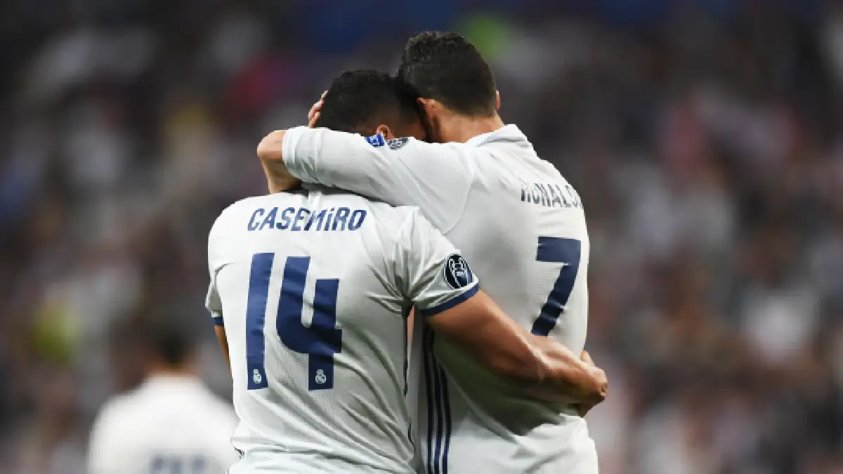MADRID, SPAIN - APRIL 18: Cristiano Ronaldo of Real Madrid celebrates scoring his sides first goal with Casemiro of Real Madrid during the UEFA Champions League Quarter Final second leg match between Real Madrid CF and FC Bayern Muenchen at Estadio Santiago Bernabeu on April 18, 2017 in Madrid, Spain. (Photo by Shaun Botterill/Getty Images)