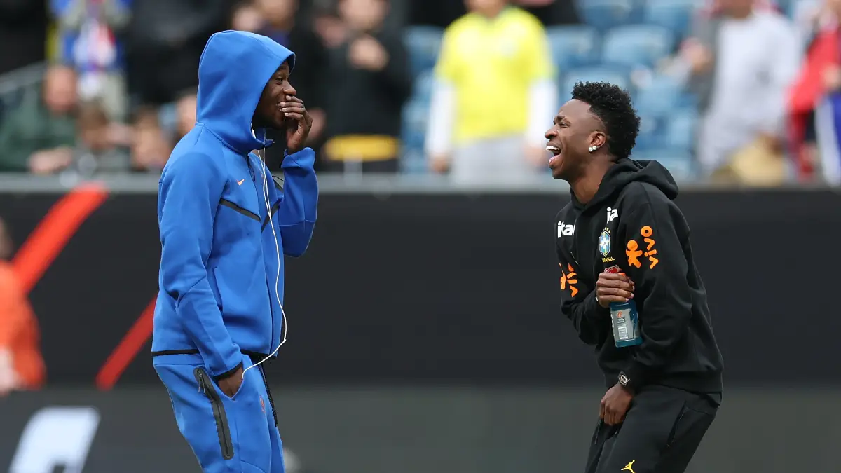FOXBOROUGH, MASSACHUSETTS - MARCH 26: (L-R) Eduardo Camavinga of France and Vinicius Junior of Brazil chat as they inspect the pitch prior to the international friendly match between Brazil and France at Gillette Stadium on March 26, 2026 in Foxborough, Massachusetts. (Photo by Maddie Meyer/Getty Images)