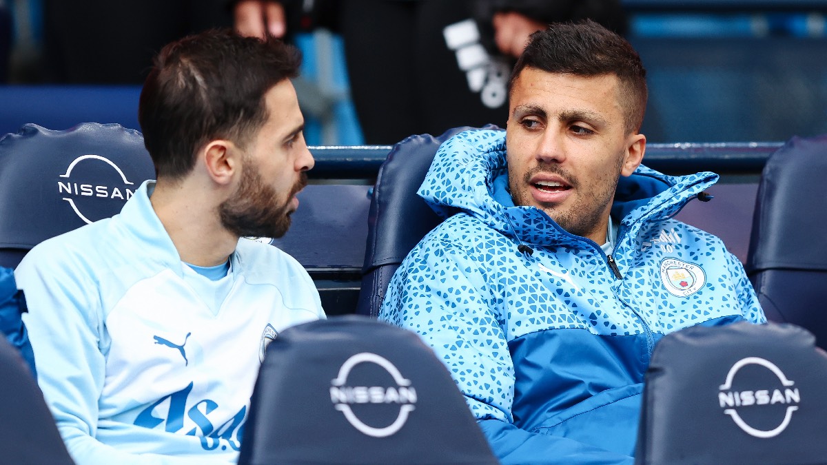 Bernardo Silva et Rodri, deux milieux ciblés par le Real Madrid. (Photo by Matt McNulty/Getty Images)