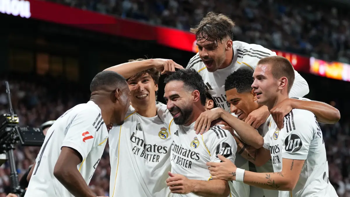 MADRID, SPAIN - MAY 23: Daniel Carvajal of Real Madrid celebrates with teammates after Gonzalo Garcia scored the team's first goal during the LaLiga EA Sports match between Real Madrid CF and Athletic Club at Estadio Santiago Bernabeu on May 23, 2026 in Madrid, Spain. (Photo by Angel Martinez/Getty Images)