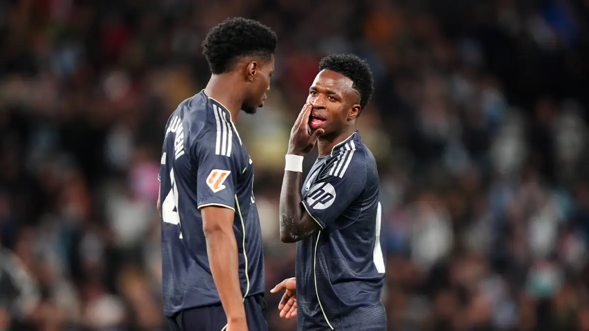 VIGO, SPAIN - MARCH 06: Vinicius Junior and Aurelien Tchouameni of Real Madrid interact during the LaLiga EA Sports match between RC Celta de Vigo and Real Madrid CF at Estadio Abanca-Balaidos on March 06, 2026 in Vigo, Spain. (Photo by Jose Manuel Alvarez Rey/Getty Images)