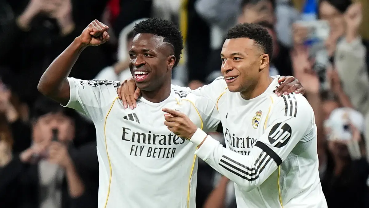 MADRID, SPAIN - JANUARY 20: Kylian Mbappe of Real Madrid celebrates scoring his team's first goal with Vinicius Junior during the UEFA Champions League 2025/26 League Phase MD7 match between Real Madrid C.F. and AS Monaco at Estadio Santiago Bernabeu on January 20, 2026 in Madrid, Spain. (Photo by Angel Martinez/Getty Images)