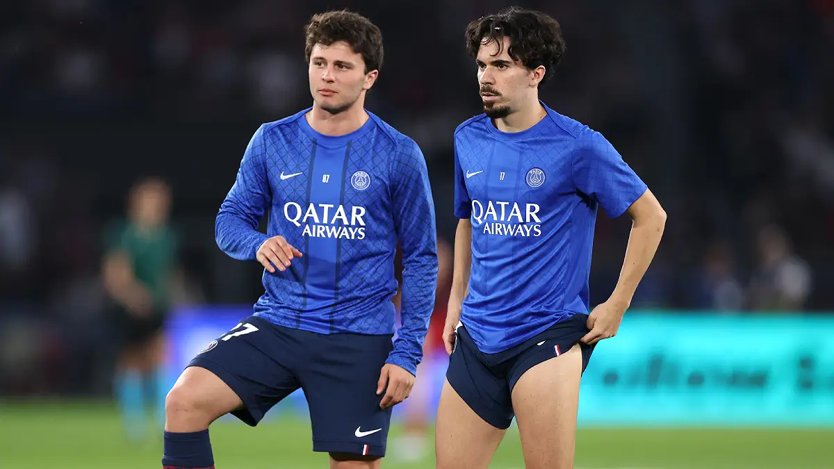 PARIS, FRANCE - APRIL 08: Joao Neves and Vitinha of Paris Saint-Germain interact during the warm up prior to the UEFA Champions League 2025/26 Quarter-Final First Leg match between Paris Saint-Germain FC and Liverpool FC at Parc des Princes on April 08, 2026 in Paris, France. (Photo by Justin Setterfield/Getty Images)