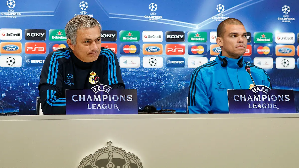 MADRID, SPAIN - APRIL 03: Head coach Jose Mourinho (L) and Pepe of Real Madrid look on during a press conference ahead of the Champions League quarter-final second leg match between Real Madrid and APOEL FC at Valdebebas training ground on April 3, 2012 in Madrid, Spain. (Photo by Angel Martinez/Getty Images)