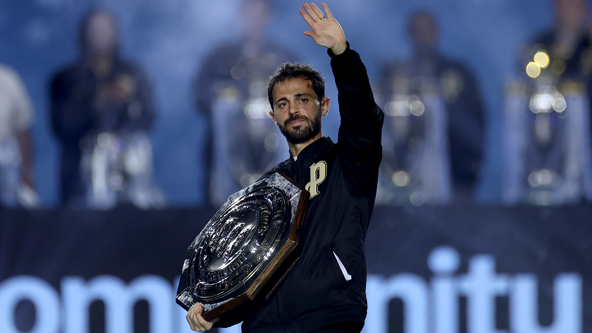 MANCHESTER, ENGLAND - MAY 25: Bernardo Silva of Manchester City brings out the 2024 FA Community Shield trophy during the After Party Celebration to mark the achievements of Manchester City men’s, women’s and academy teams during the 25/26 season at The Co-op Live Arena on May 25, 2026 in Manchester, England. (Photo by Lewis Storey/Getty Images)
