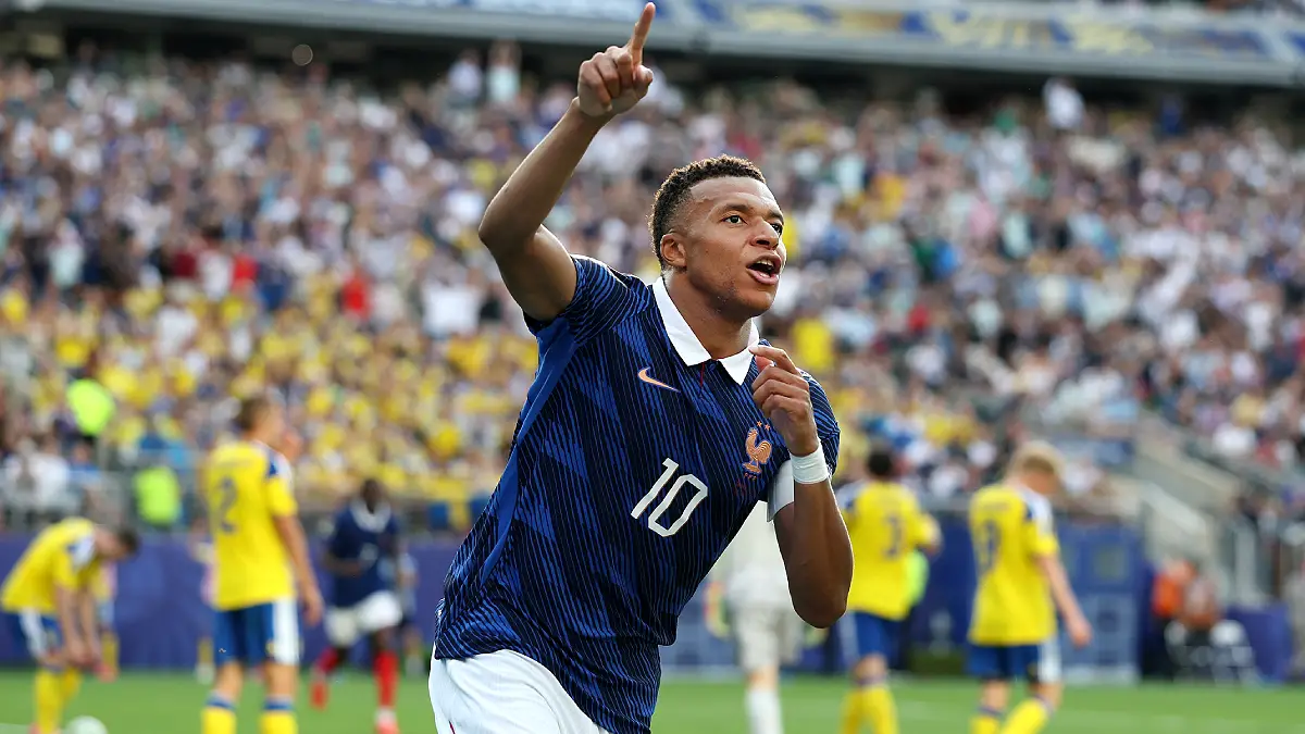 EAST RUTHERFORD, NEW JERSEY - JUNE 30: Kylian Mbappe #10 of France celebrates scoring his team's third goal during the FIFA World Cup 2026 Round Of 32 match between France and Sweden at New York New Jersey Stadium on June 30, 2026 in East Rutherford, New Jersey. (Photo by Al Bello/Getty Images)