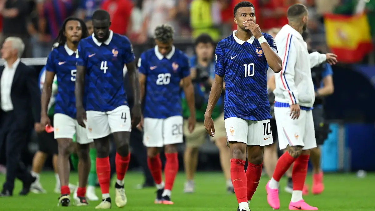 ARLINGTON, TEXAS - JULY 14: Kylian Mbappe #10 of France reacts after the 0-2 loss during the FIFA World Cup 2026 Semi Final match between France and Spain at Dallas Stadium on July 14, 2026 in Arlington, Texas. (Photo by Shaun Botterill/Getty Images)