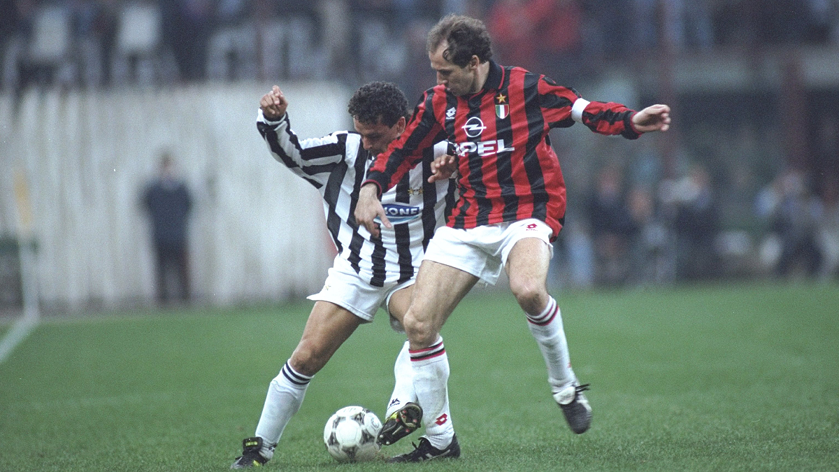 1 Apr 1995: Robertio Baggio (left) of Juventus takes on Franco Baresi (right) of AC Milan during a Serie A match at the San Siro Stadium in Milan, Italy. Juventus won the match 2-0. \ Mandatory Credit: Allsport UK /Allsport