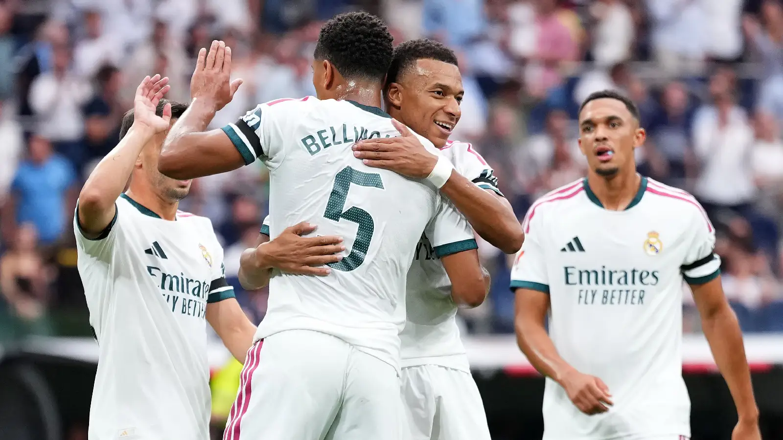 MADRID, SPAIN - AUGUST 30: Jude Bellingham and Kylian Mbappe of Real Madrid celebrate after Alfonso Herrero of Malaga scores an own goal, the second goal for Real Madrid during the LaLiga EA Sports 2026/27 match between Real Madrid and Malaga CF at Estadio Santiago Bernabeu on August 30, 2026 in Madrid, Spain. (Photo by Angel Martinez/Getty Images)
