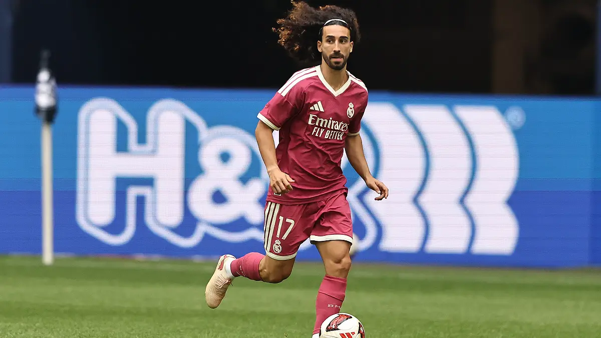 GELSENKIRCHEN, GERMANY - AUGUST 16: Marc Cucurella of Real Madrid runs with the ball during the Pre-Season Friendly match between FC Schalke 04 and Real Madrid at Veltins Arena on August 16, 2026 in Gelsenkirchen, Germany. (Photo by Christof Koepsel/Getty Images)