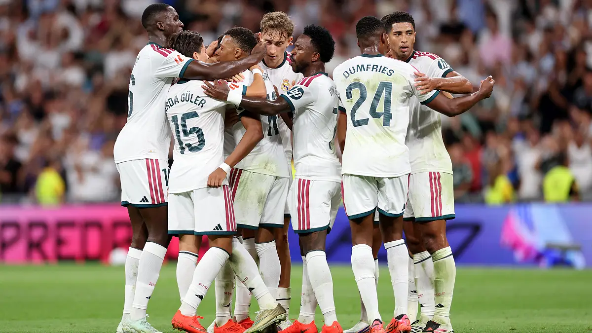 MADRID, SPAIN - AUGUST 26: Kylian Mbappe of Real Madrid celebrates scoring his team’s first goal with teammates during the LaLiga EA Sports 2026/27 match between Real Madrid and Real Sociedad at Estadio Santiago Bernabeu on August 26, 2026 in Madrid, Spain. (Photo by Florencia Tan Jun/Getty Images)