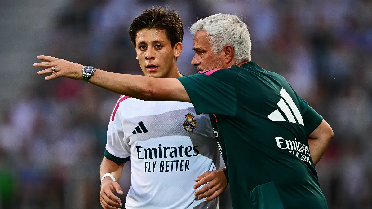 KLAGENFURT, AUSTRIA - AUGUST 01: Jose Mourinho, Head Coach of Real Madrid, speaks with Arda Güler of Real Madrid during the pre-season friendly match between Real Madrid and Fiorentina at Woerthersee Stadion on August 01, 2026 in Klagenfurt, Austria. (Photo by Christian Bruna/Getty Images)
