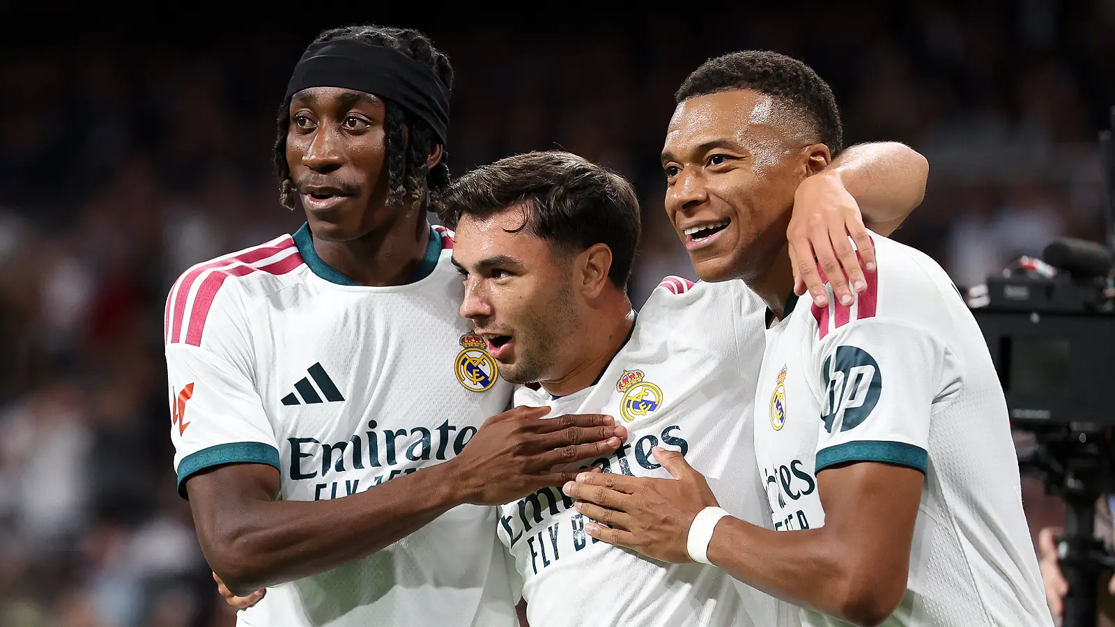 MADRID, SPAIN - AUGUST 26: Brahim Diaz of Real Madrid celebrates with teammates Kylian Mbappe and Yan Diomandeafter scoring a goal that was later disallowed during the LaLiga EA Sports 2026/27 match between Real Madrid and Real Sociedad at Estadio Santiago Bernabeu on August 26, 2026 in Madrid, Spain. (Photo by Florencia Tan Jun/Getty Images)