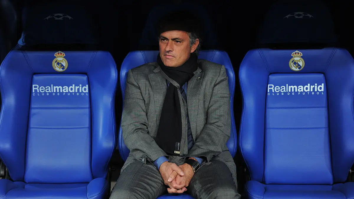 MADRID, SPAIN - OCTOBER 19: Head coach Jose Mourinho of Real Madrid looks on while seated on the bench prior to the start of the UEFA Champions League group G match between Real Madrid and AC Milan at the Estadio Santiago Bernabeu on October 19, 2010 in Madrid, Spain. Real Madrid won the match 2-0. (Photo by Jasper Juinen/Getty Images)
