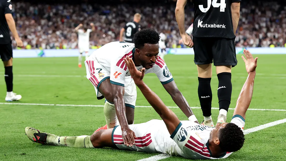 MADRID, SPAIN - AUGUST 26: Vinicius Junior of Real Madrid celebrates scoring his team’s third goal with Jude Bellingham during the LaLiga EA Sports 2026/27 match between Real Madrid and Real Sociedad at Estadio Santiago Bernabeu on August 26, 2026 in Madrid, Spain. (Photo by Florencia Tan Jun/Getty Images)