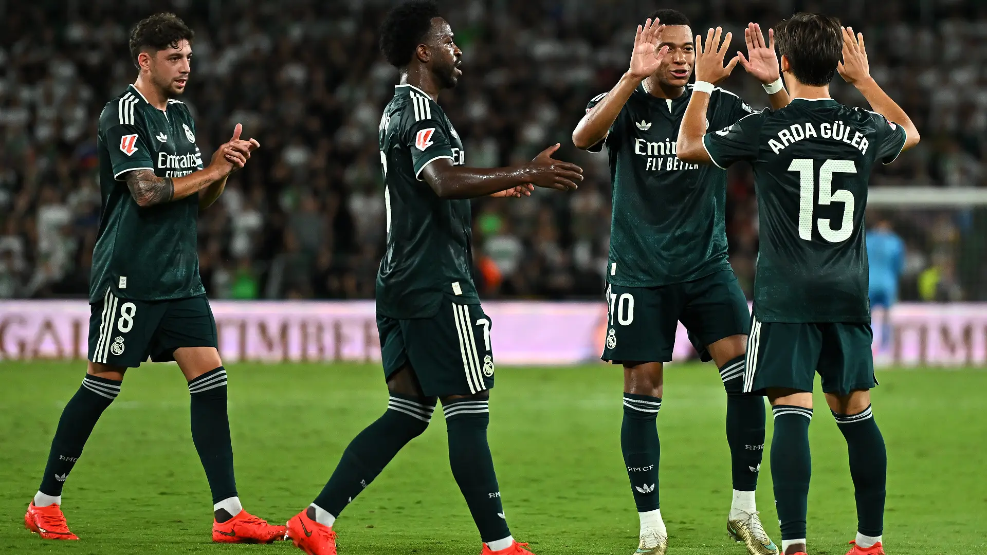 ELCHE, SPAIN - SEPTEMBER 15: Arda Guler of Real Madrid celebrates his team’s first goal with teammate Kylian Mbappe which was an own goal scored by Matias Dituro of Elche CF during the LaLiga EA Sports 2026/27 match between Elche CF and Real Madrid at Estadio Manuel Martinez Valero on September 15, 2026 in Elche, Spain. (Photo by Francisco Macia/Getty Images)