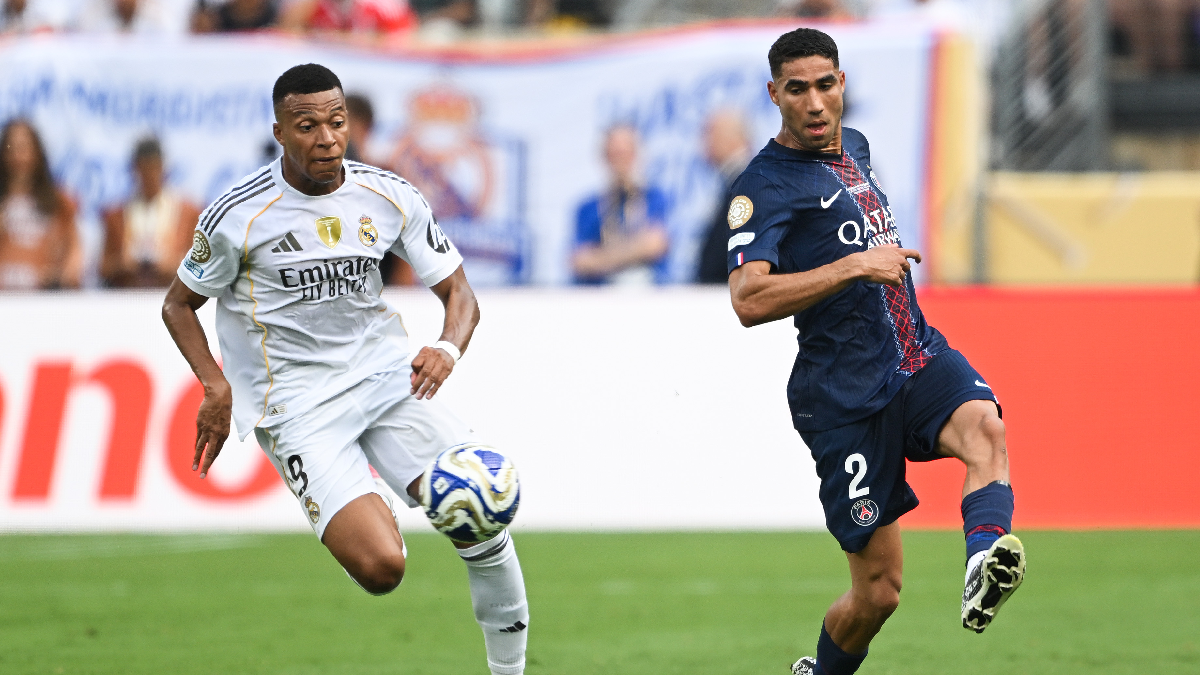 EAST RUTHERFORD, NEW JERSEY - JULY 09: Achraf Hakimi #2 of Paris Saint-Germain is challenged by Kylian Mbappe #9 of Real Madrid C.F. during the FIFA Club World Cup 2025 semi-final match between Paris Saint-Germain and Real Madrid CF at MetLife Stadium on July 09, 2025 in East Rutherford, New Jersey. (Photo by David Ramos/Getty Images)