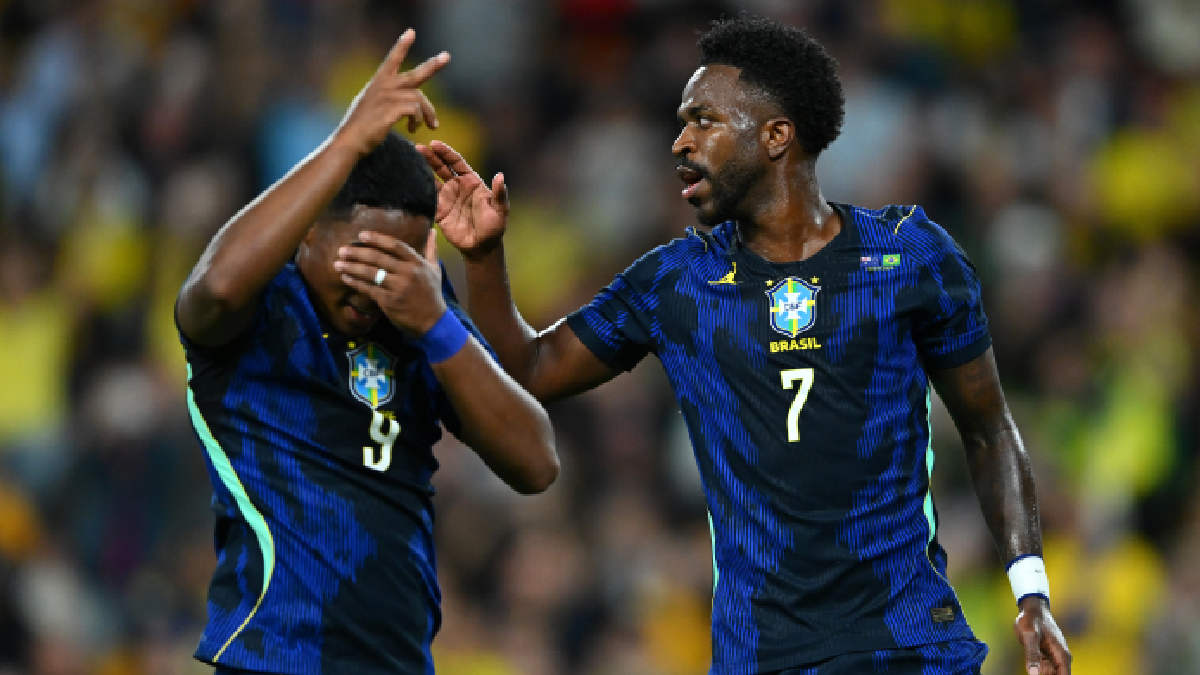 BRISBANE, AUSTRALIA - SEPTEMBER 29: Vinicius Jose Paixao de Oliveira Junior (R) of Brazil celebrates scoring a goal with Endrick during the International Friendly match between Australia Socceroos and Brazil at Suncorp Stadium on September 29, 2026 in Brisbane, Australia. (Photo by Matt Roberts/Getty Images)