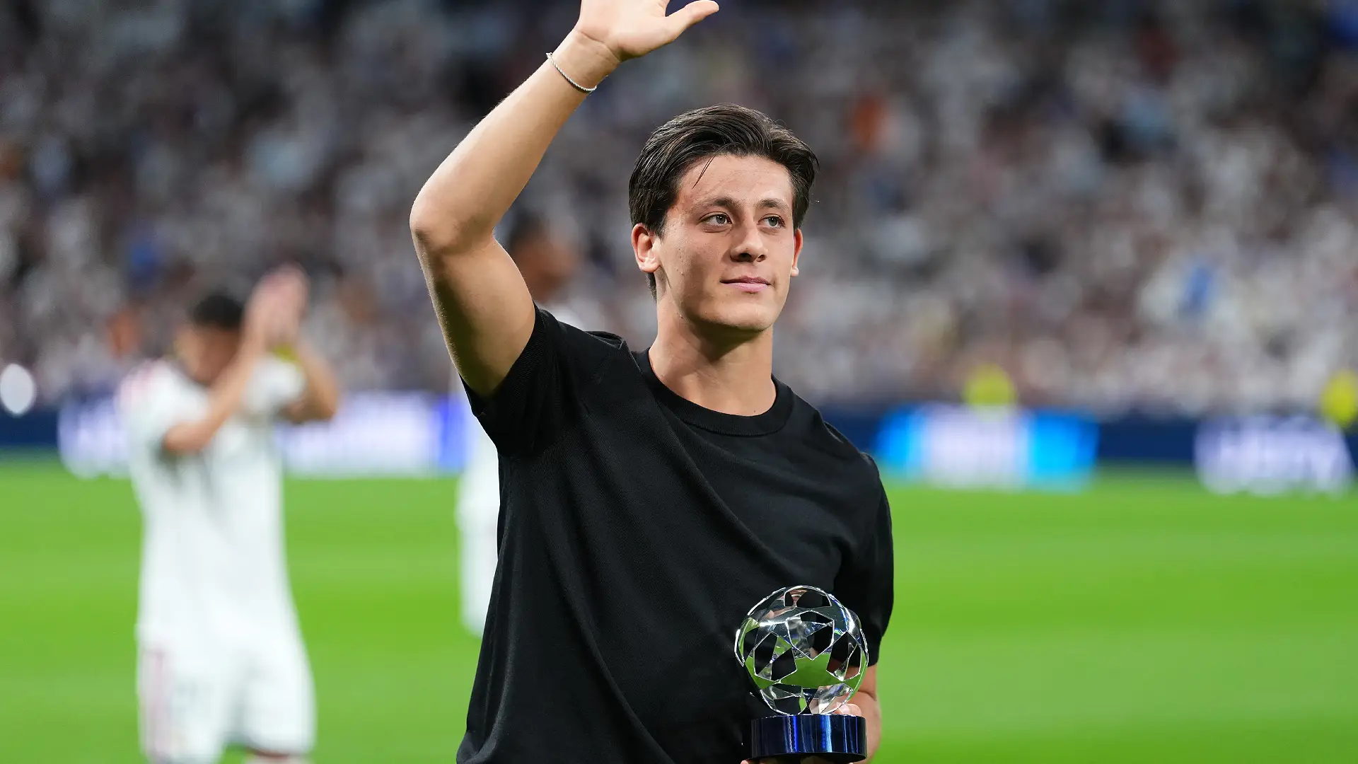MADRID, SPAIN - SEPTEMBER 08: Arda Guler is awarded the 2025/26 UEFA Champions League Revelation of the Season award before the UEFA Champions League 2026/27 League Phase MD1 match between Real Madrid C.F. and FC Internazionale Milano at Estadio Santiago Bernabeu on September 08, 2026 in Madrid, Spain. (Photo by Angel Martinez/Getty Images)