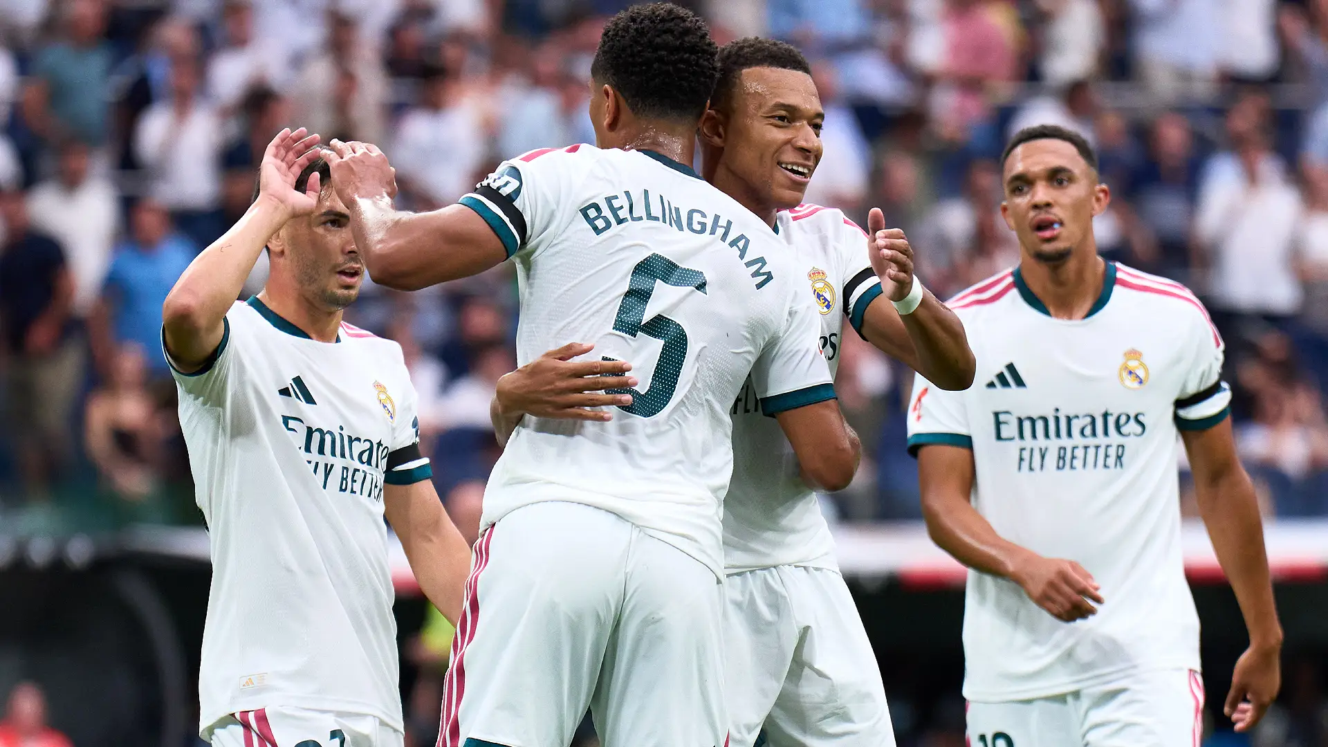 MADRID, SPAIN - AUGUST 30: Jude Bellingham and Kylian Mbappe of Real Madrid celebrate after Alfonso Herrero of Malaga scores an own goal, the second goal for Real Madrid during the LaLiga EA Sports 2026/27 match between Real Madrid and Malaga CF at Estadio Santiago Bernabeu on August 30, 2026 in Madrid, Spain. (Photo by Angel Martinez/Getty Images)