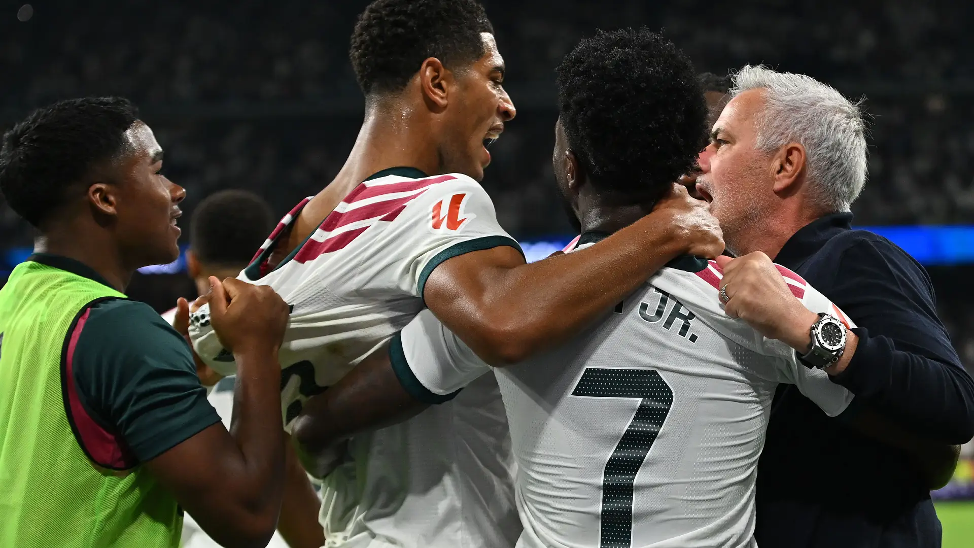MADRID, SPAIN - OCTOBER 10: Vinicius Junior of Real Madrid celebrates with Jude Bellingham and Jose Mourinho, Manager of Real Madrid, after scoring a goal that was later disallowed following a foul during the LaLiga EA Sports 2026/27 match between Real Madrid and Villarreal CF at Estadio Santiago Bernabeu on October 10, 2026 in Madrid, Spain. (Photo by Denis Doyle/Getty Images)
