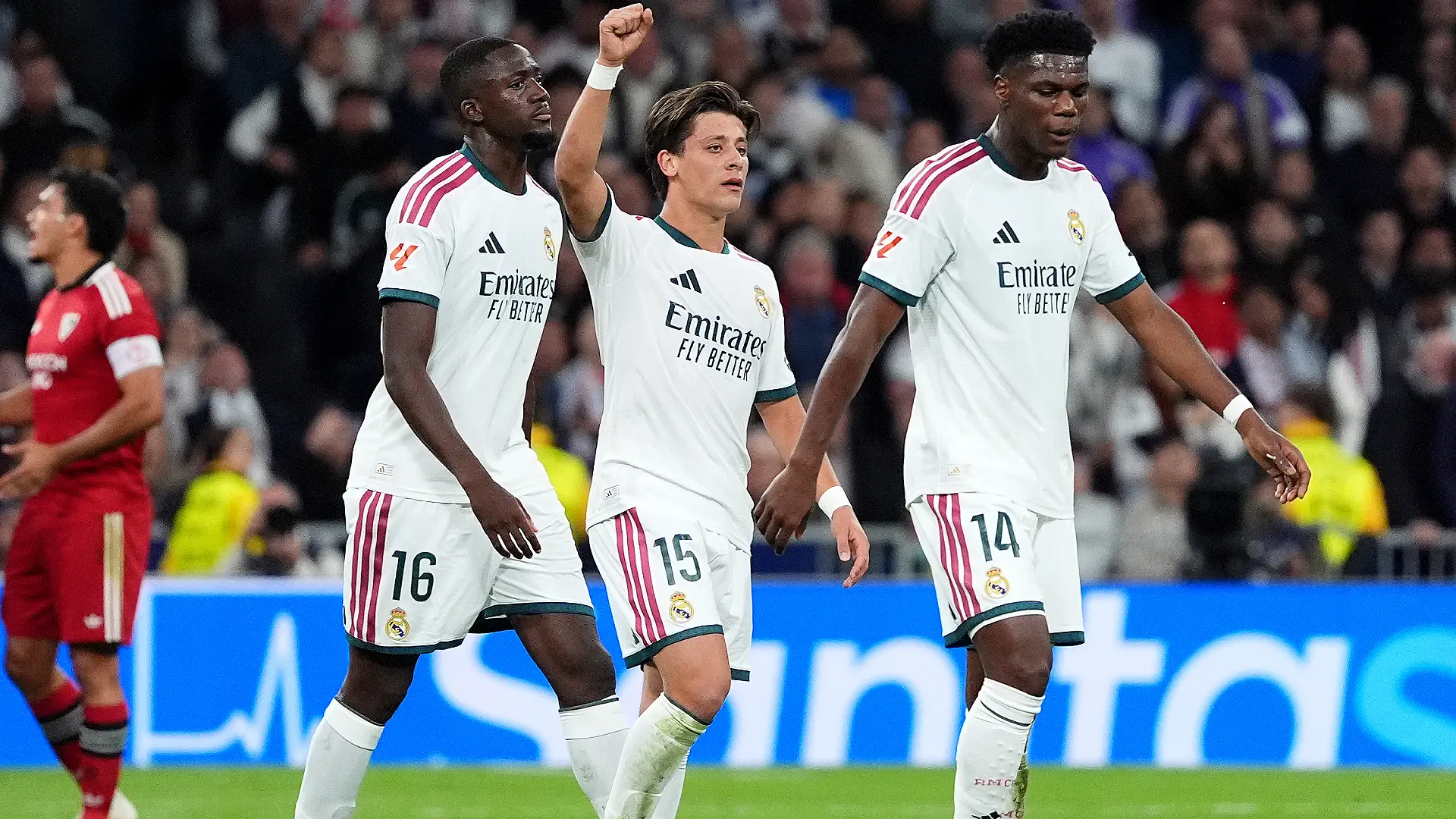 MADRID, SPAIN - OCTOBER 18: Arda Guler of Real Madrid celebrates scoring his team’s first goal with teammates Ibrahima Konate and Aurelien Tchouameni during the LaLiga EA Sports 2026/27 match between Real Madrid and Sevilla FC at Estadio Santiago Bernabeu on October 18, 2026 in Madrid, Spain. (Photo by Angel Martinez/Getty Images)