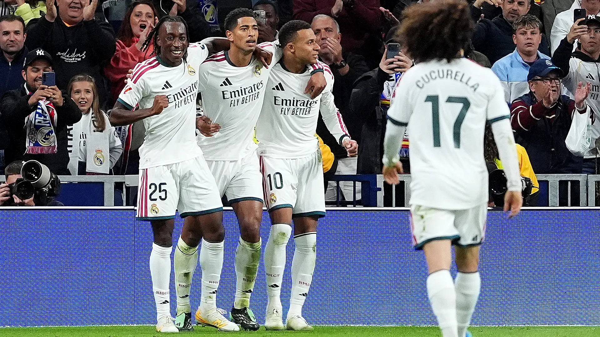 MADRID, SPAIN - OCTOBER 18: Kylian Mbappe of Real Madrid celebrates scoring his team’s second goal with teammates Yan Diomande and Jude Bellingham during the LaLiga EA Sports 2026/27 match between Real Madrid and Sevilla FC at Estadio Santiago Bernabeu on October 18, 2026 in Madrid, Spain. (Photo by Angel Martinez/Getty Images)