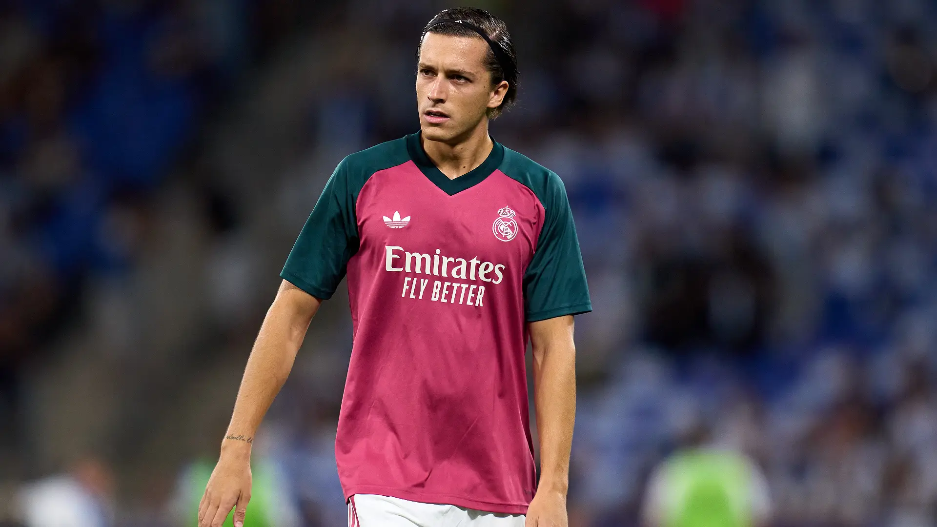 BARCELONA, SPAIN - AUGUST 22: Alvaro Carreras of Real Madrid CF looks on during the warm up before the LaLiga EA Sports 2026/27 match between RCD Espanyol de Barcelona and Real Madrid at RCDE Stadium on August 22, 2026 in Barcelona, Spain. (Photo by Alex Caparros/Getty Images)