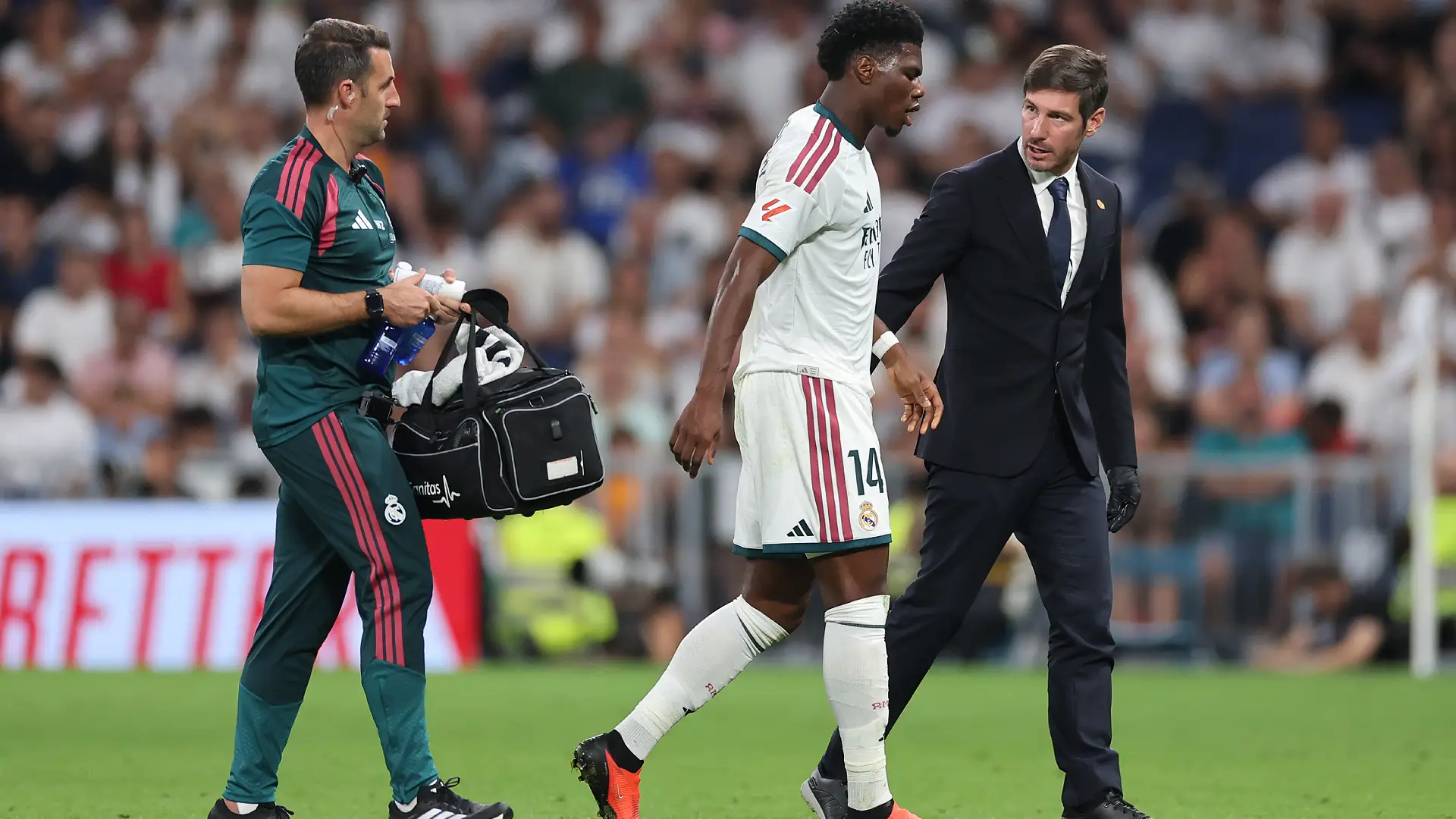 MADRID, SPAIN - SEPTEMBER 12: Aurelien Tchouameni of Real Madrid walks off the pitch after receiving medical attention during the LaLiga EA Sports 2026/27 match between Real Madrid and Rayo Vallecano de Madrid at Estadio Santiago Bernabeu on September 12, 2026 in Madrid, Spain. (Photo by Florencia Tan Jun/Getty Images)