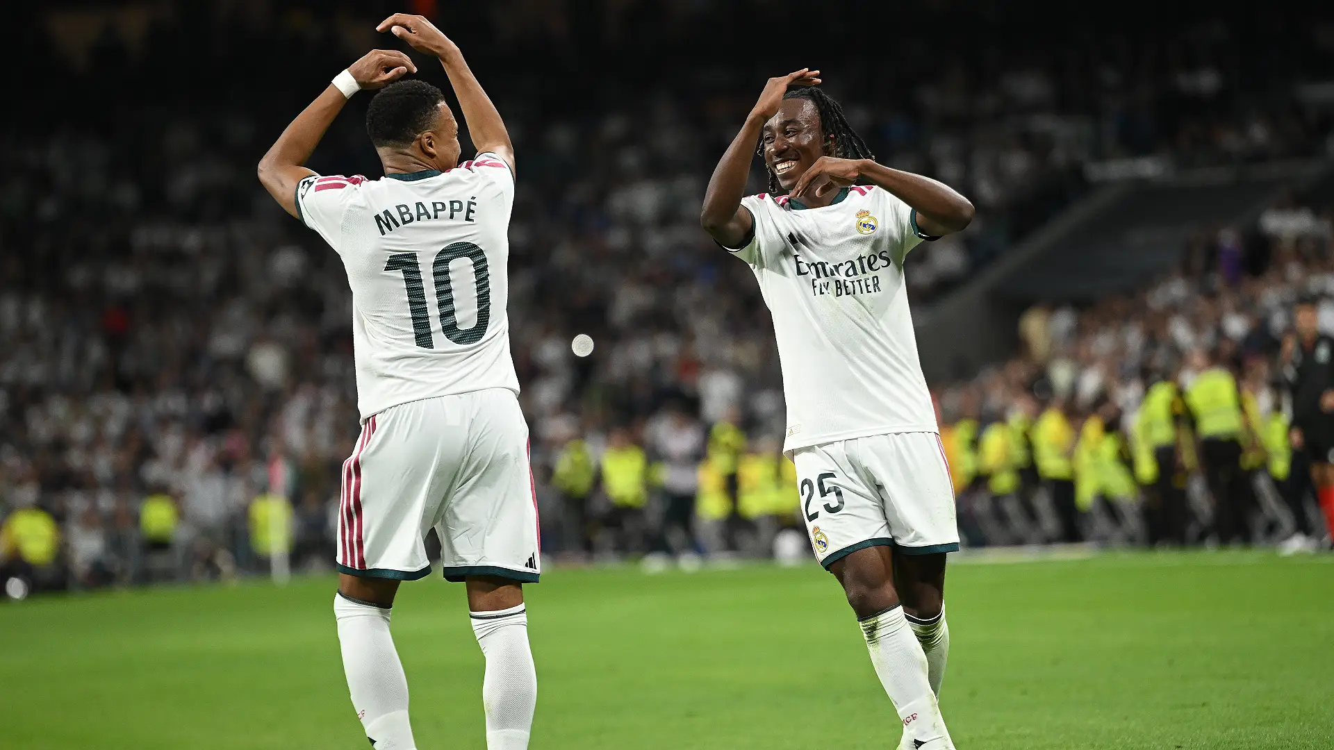 MADRID, SPAIN - OCTOBER 10: Yan Diomande of Real Madridcelebrates scoring his team's opening goal with his teammate Kylian Mbappe during the LaLiga EA Sports 2026/27 match between Real Madrid and Villarreal CF at Estadio Santiago Bernabeu on October 10, 2026 in Madrid, Spain. (Photo by Denis Doyle/Getty Images)