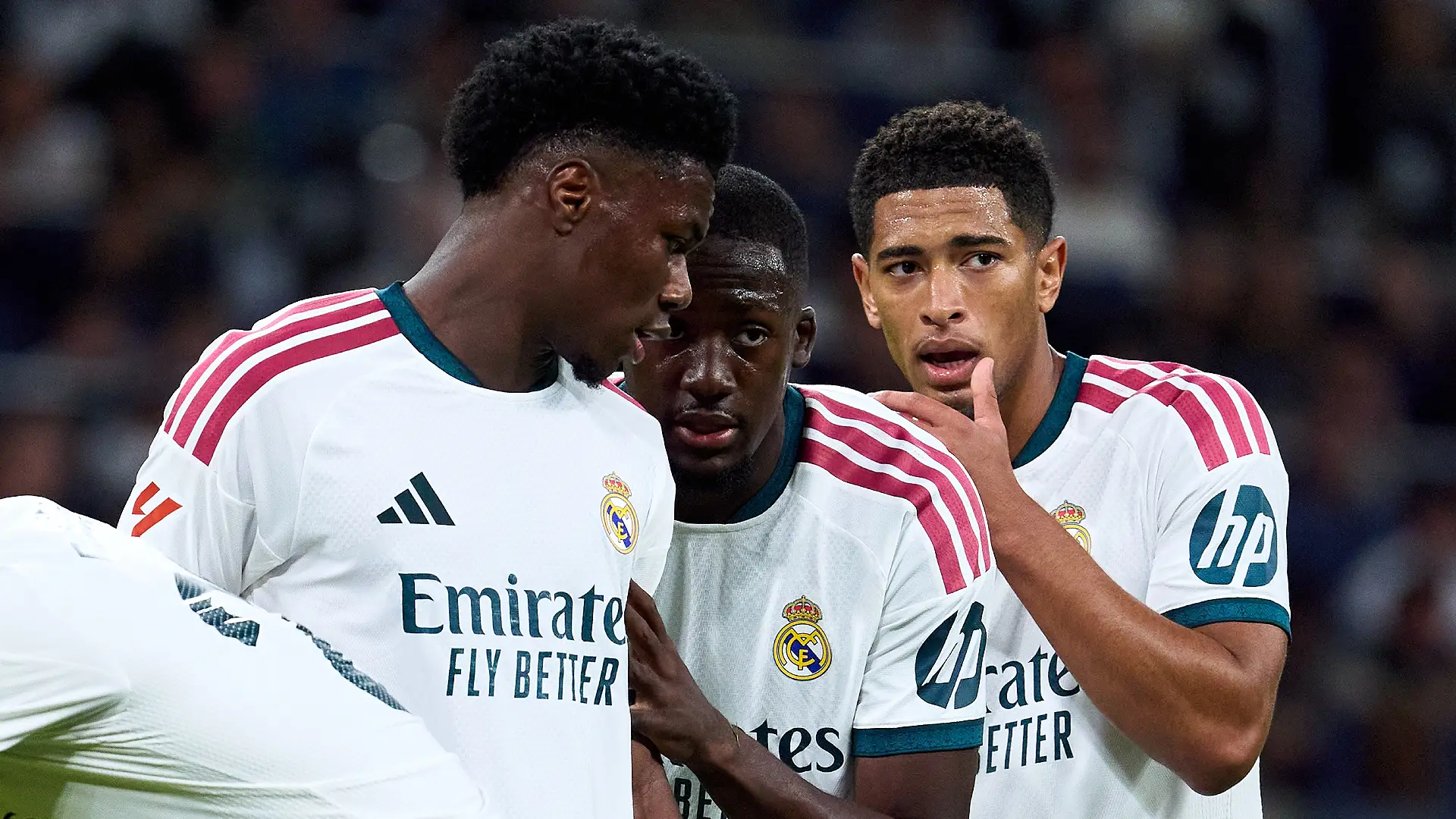 MADRID, SPAIN - OCTOBER 10: Aurelien Tchouameni, Ibrahima Konaté and Jude Bellingham of Real Madrid interact during the LaLiga EA Sports 2026/27 match between Real Madrid and Villarreal CF at Estadio Santiago Bernabeu on October 10, 2026 in Madrid, Spain. (Photo by Angel Martinez/Getty Images)