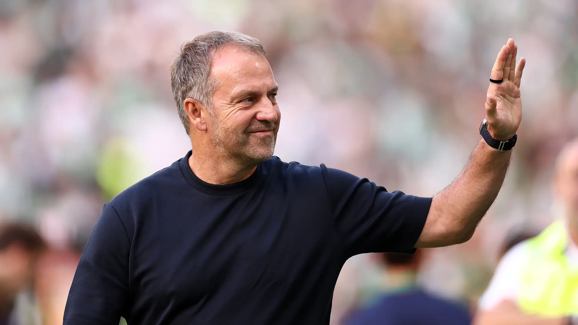 SEVILLE, SPAIN - OCTOBER 17: Hansi Flick, Manager of FC Barcelona, acknowledges the fans before the LaLiga EA Sports 2026/27 match between Real Betis Balompie and FC Barcelona at Estadio La Cartuja on October 17, 2026 in Seville, Spain. (Photo by Fran Santiago/Getty Images)