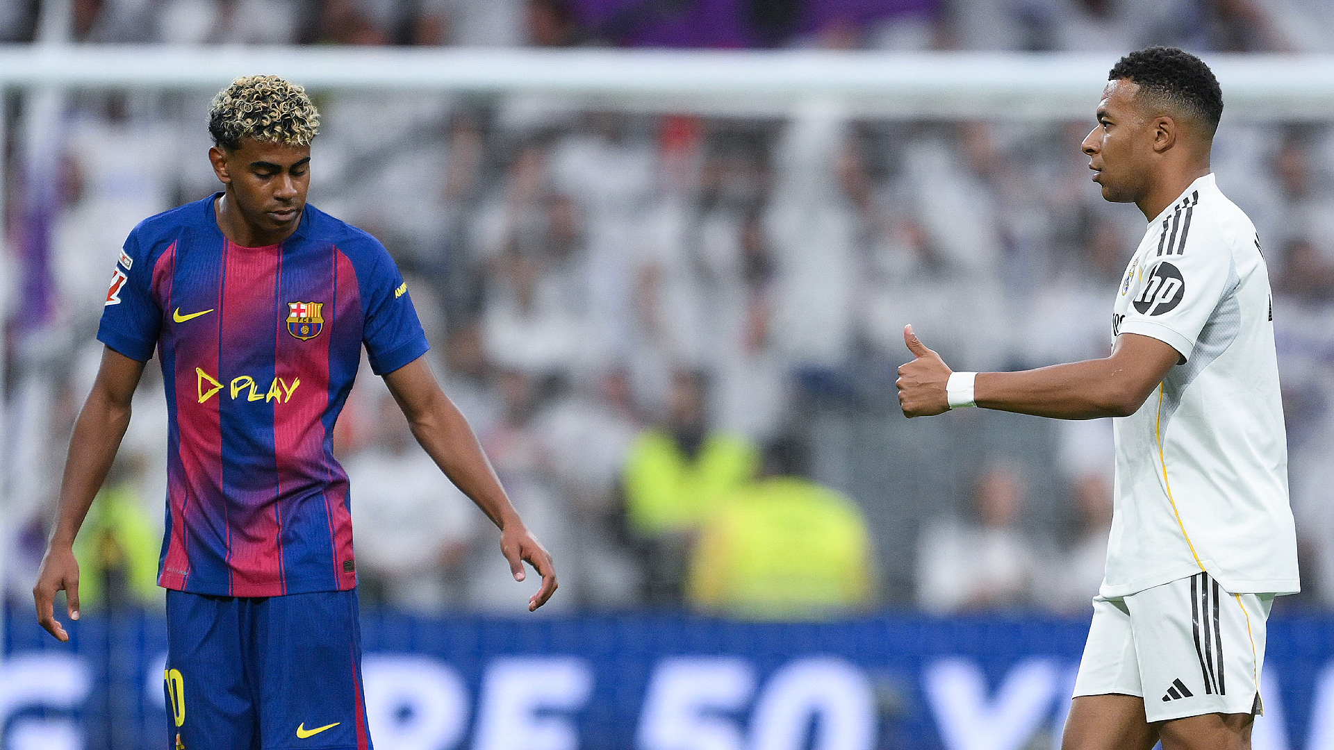 MADRID, SPAIN - OCTOBER 26: Kylian Mbappe of Real Madrid celebrates their team's first goal past Lamine Yamal of FC Barcelona during the LaLiga EA Sports match between Real Madrid CF and FC Barcelona at Estadio Santiago Bernabeu on October 26, 2025 in Madrid, Spain. (Photo by David Ramos/Getty Images)