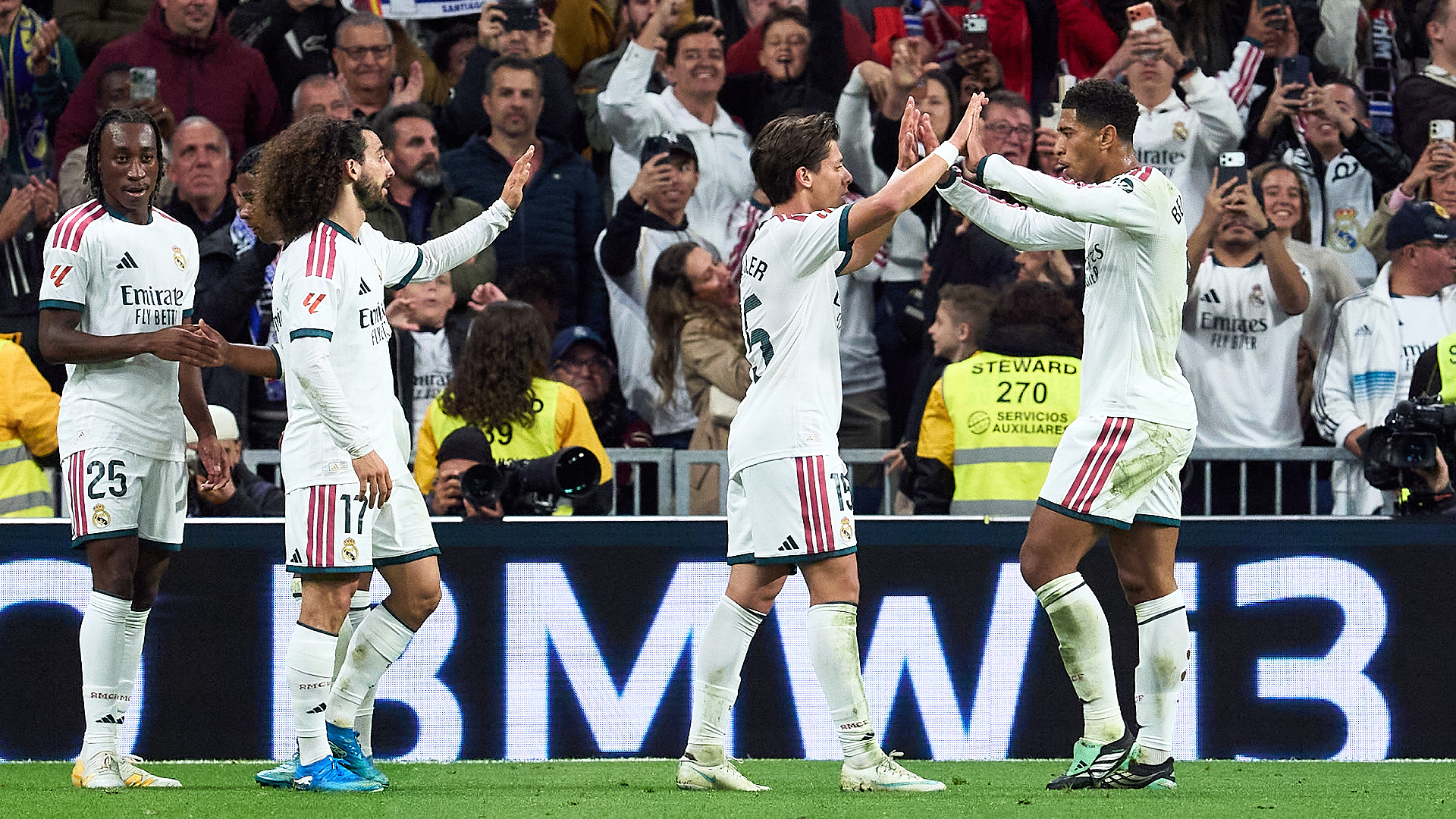 MADRID, SPAIN - OCTOBER 18: Arda Guler of Real Madrid celebrates after scoring his team's first goal with Jude Bellingham during the LaLiga EA Sports 2026/27 match between Real Madrid and Sevilla FC at Estadio Santiago Bernabeu on October 18, 2026 in Madrid, Spain. (Photo by Angel Martinez/Getty Images)